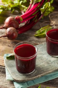 Beet juice in glass tumbler